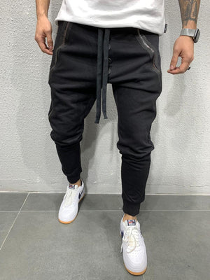 Pantalon décontracté de sport à fermeture éclair élastique pour hommes