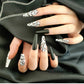 Ongles de ballet longs avec des gouttelettes d'eau plates et pointues