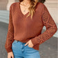 Pull tricoté creux à la mode pour femme