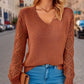 Pull tricoté creux à la mode pour femme