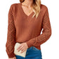 Pull tricoté creux à la mode pour femme